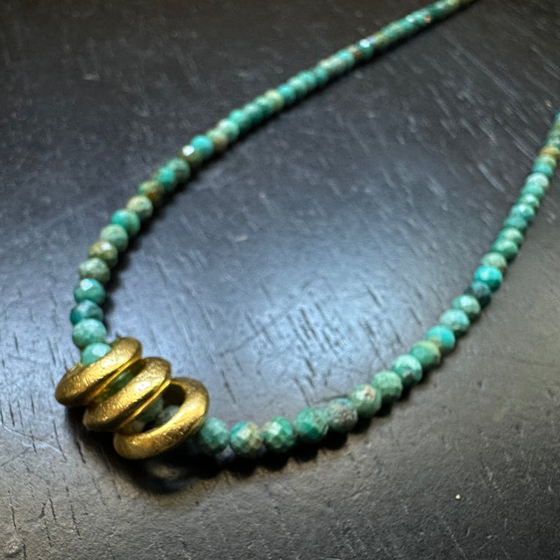 Triple Gold Saucer Bead Necklace on Turquoise Strand