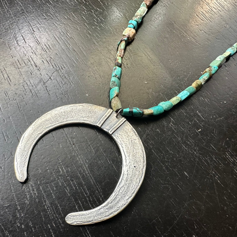 Moon Tusk Pendant - Sterling Silver on Afghani Turquoise Strand