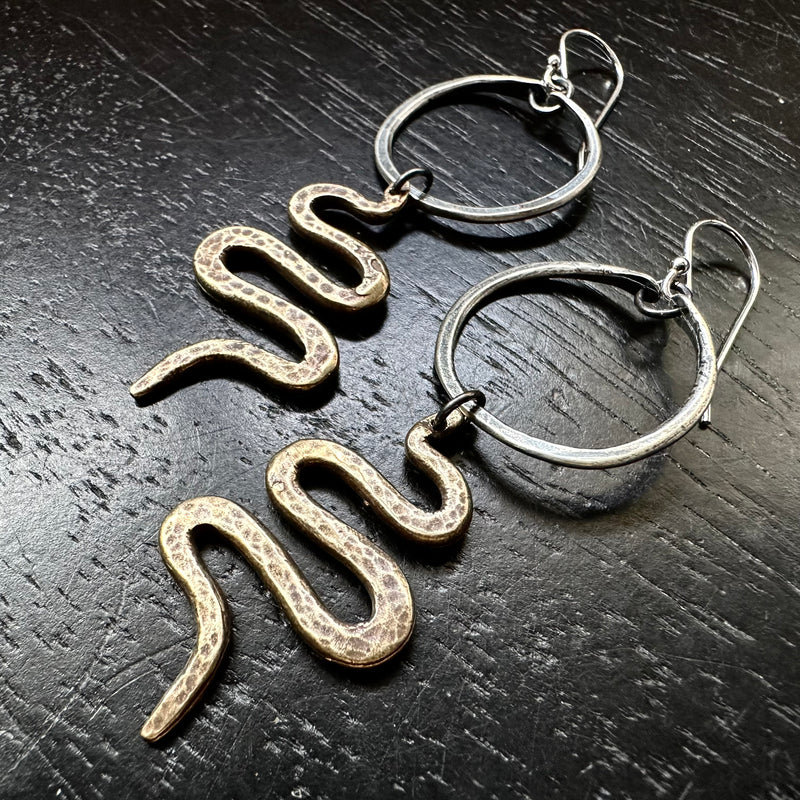 Snakes Suspended from Tiny Hoops