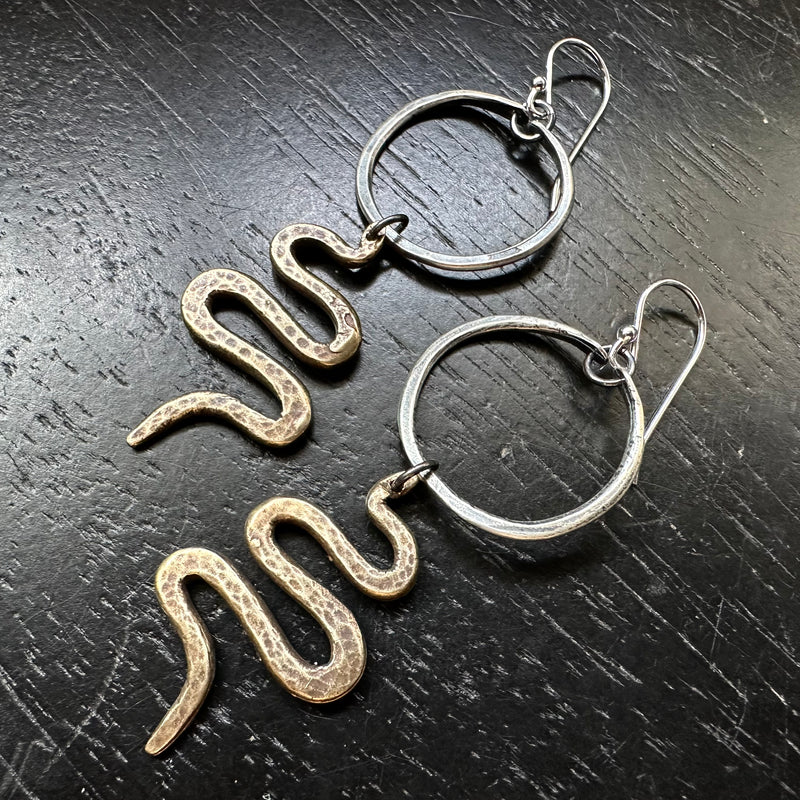 Snakes Suspended from Tiny Hoops