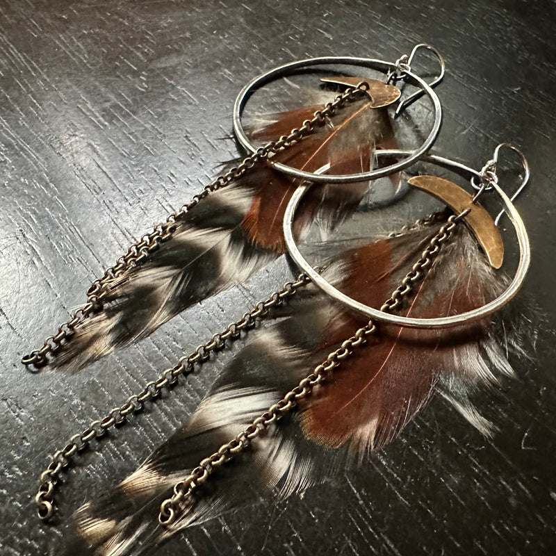 HERA GODDESS Feather Earrings: Medium Silver Hoops, Brass Moons, Earth tone Feathers