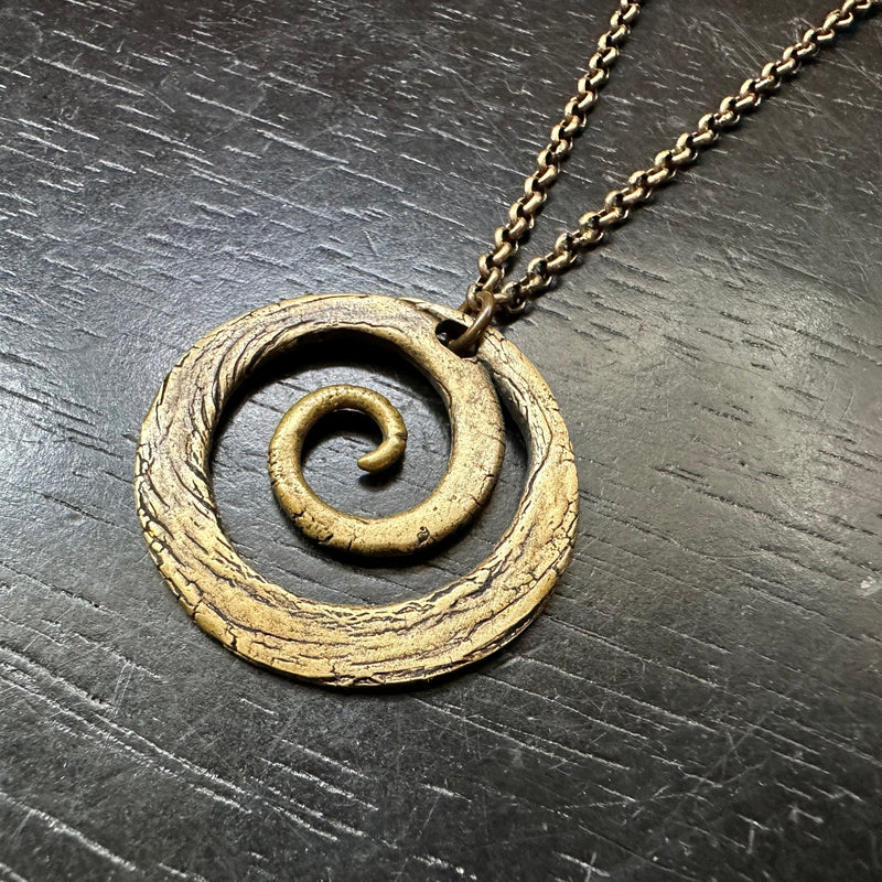 LARGE BRASS Carved Spiral on Oxidized Brass Necklace – jenkahnjewelry