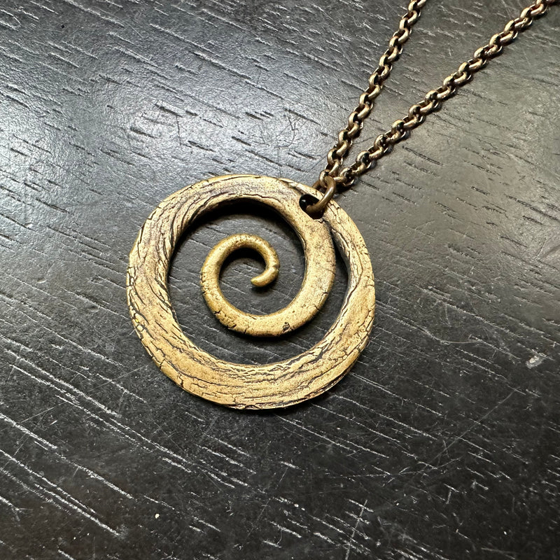 LARGE BRASS Carved Spiral on Oxidized Brass Necklace – jenkahnjewelry