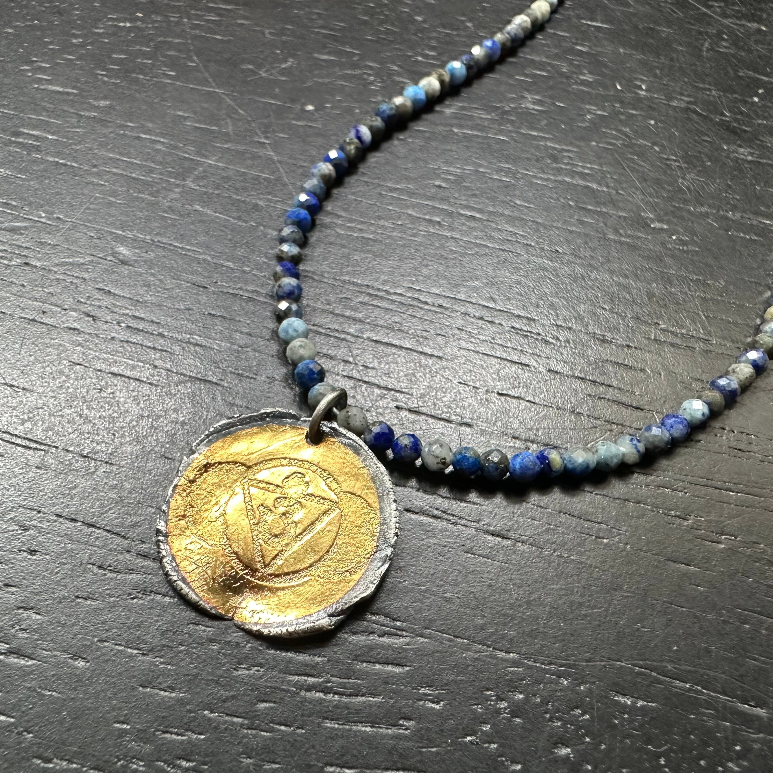 Chakra Kahn: Gold + Silver Chakra Pendant on Full Crystal Strand