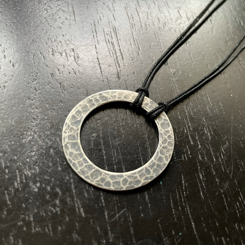 KAHN MAN: Thick Hammered Sterling Silver Circle Pendant
