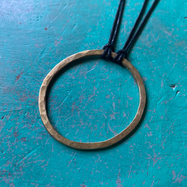 KAHN MAN: Thin Medium Hammered Brass Circle Pendant