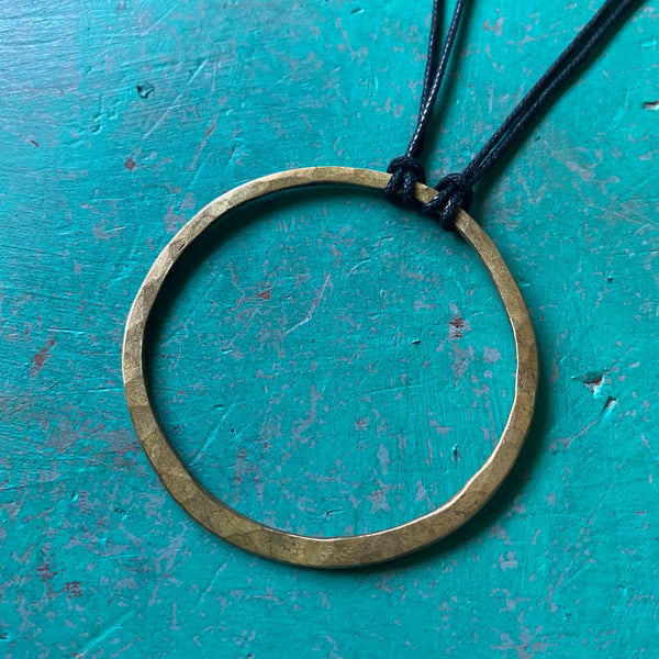KAHN MAN: Thin Large Hammered Brass Circle Pendant