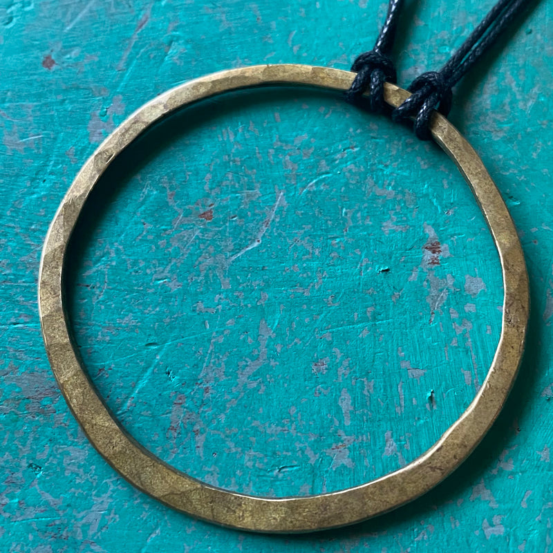 KAHN MAN: Thin Large Hammered Brass Circle Pendant