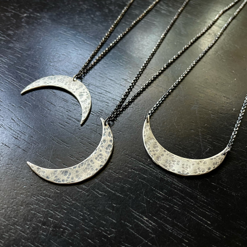 large crescent moon necklace comes on black cord... - Depop