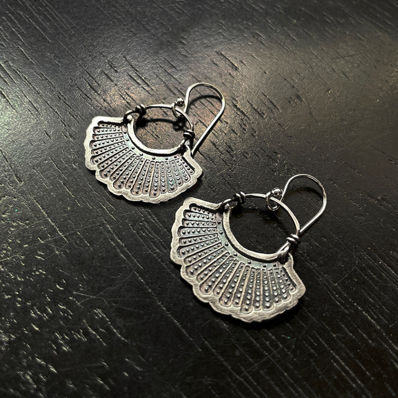 Dissent earrings silver on sale